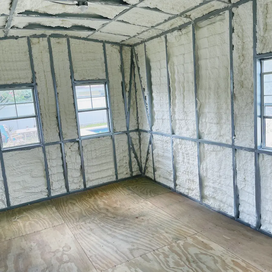 Closed-cell spray foam insulation applied to wall cavities in a residential project in Land O' Lakes